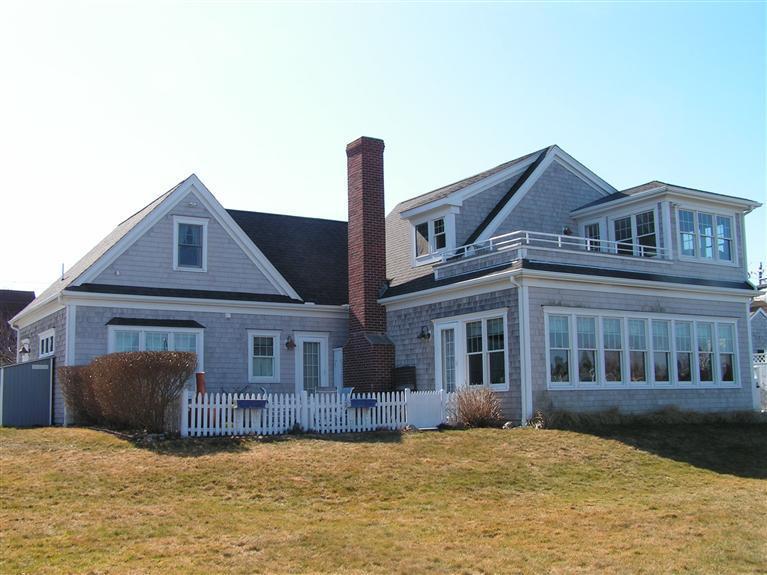 132 Bay Shore Road Hyannis, MA 02601 - Photo 4 of 34 a front view of a house with yard