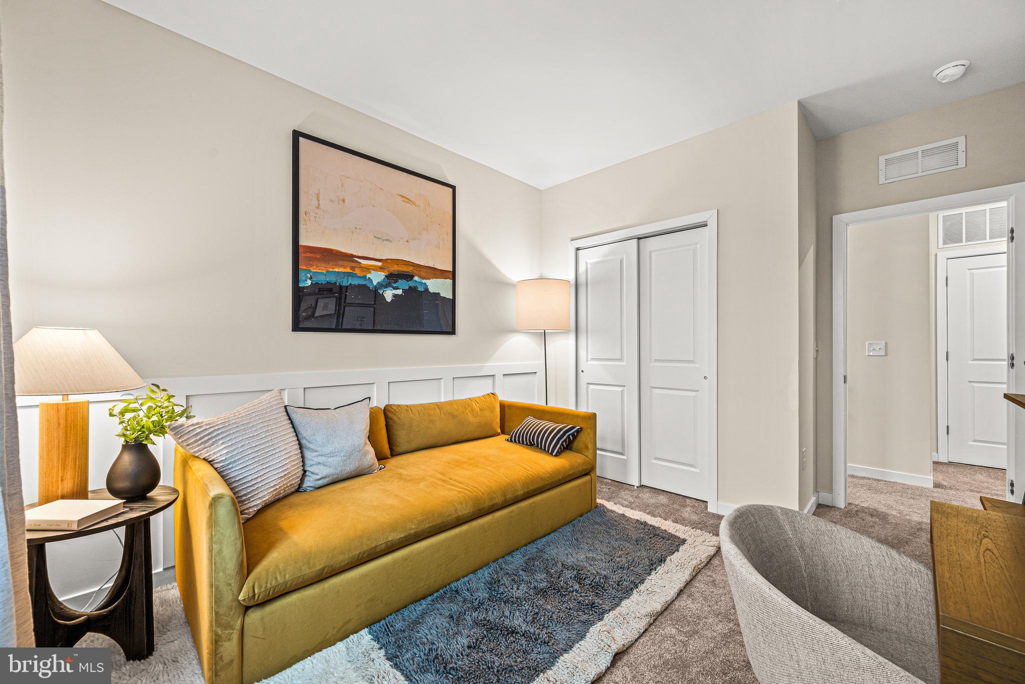 13B Ford Street, Unit A Bridgeport, PA 19405 - Photo 26 of 26 a living room with furniture and a rug