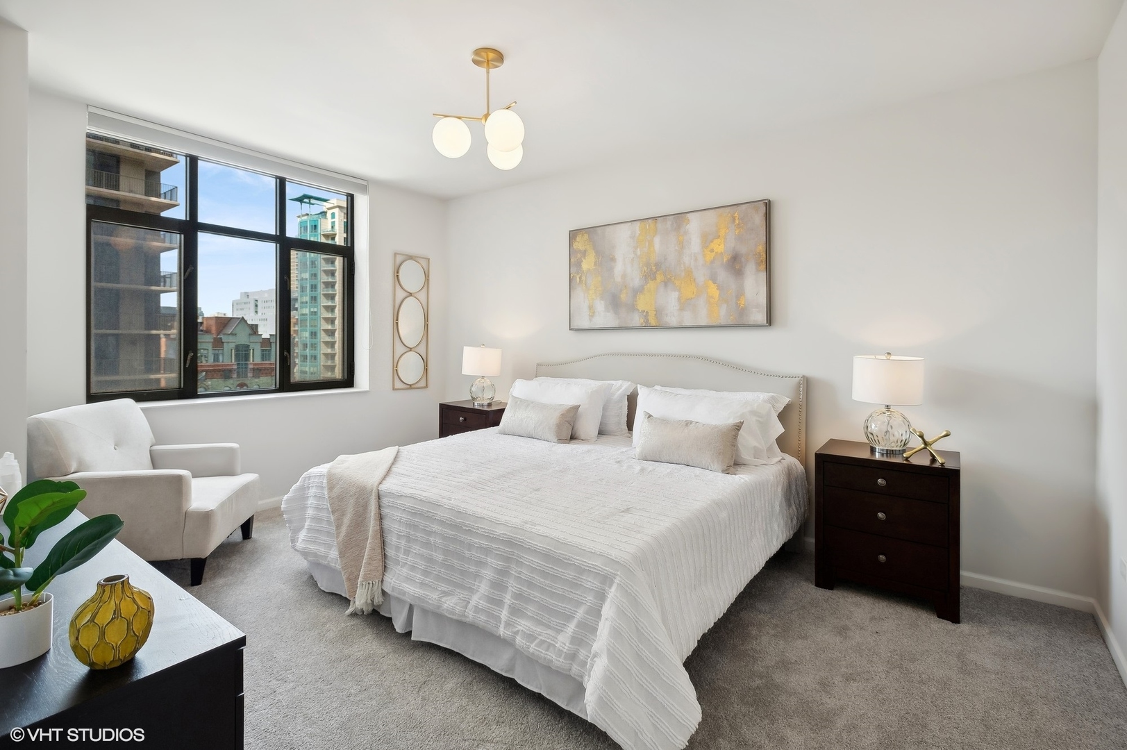 630 North State Street, Unit 1108 Chicago, IL 60654 - Photo 14 of 22 a bedroom with a bed and window