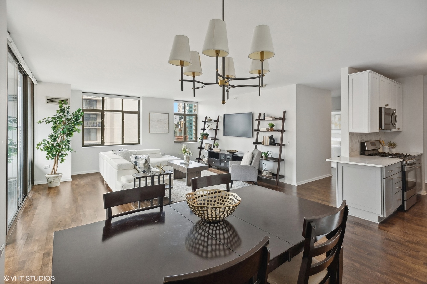 630 North State Street, Unit 1108 Chicago, IL 60654 - Photo 7 of 22 a view of a dining room with furniture