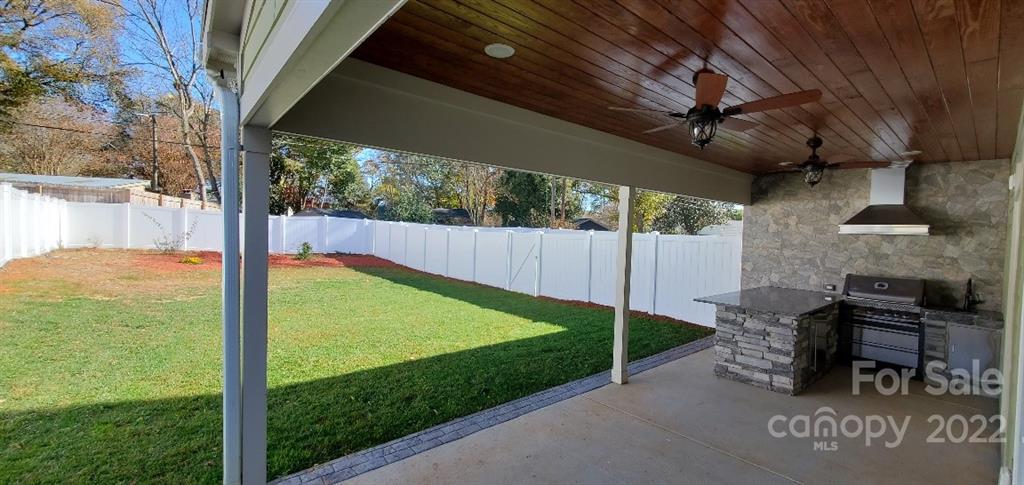 5201 Valley Stream Road Charlotte, NC 28209 - Photo 4 of 17 a view of a backyard with hardwood