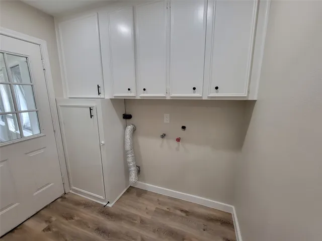 an empty room with cabinet