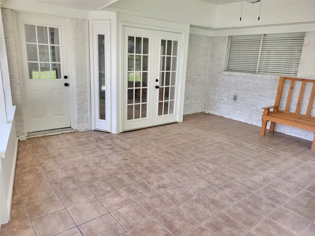 an empty room with windows