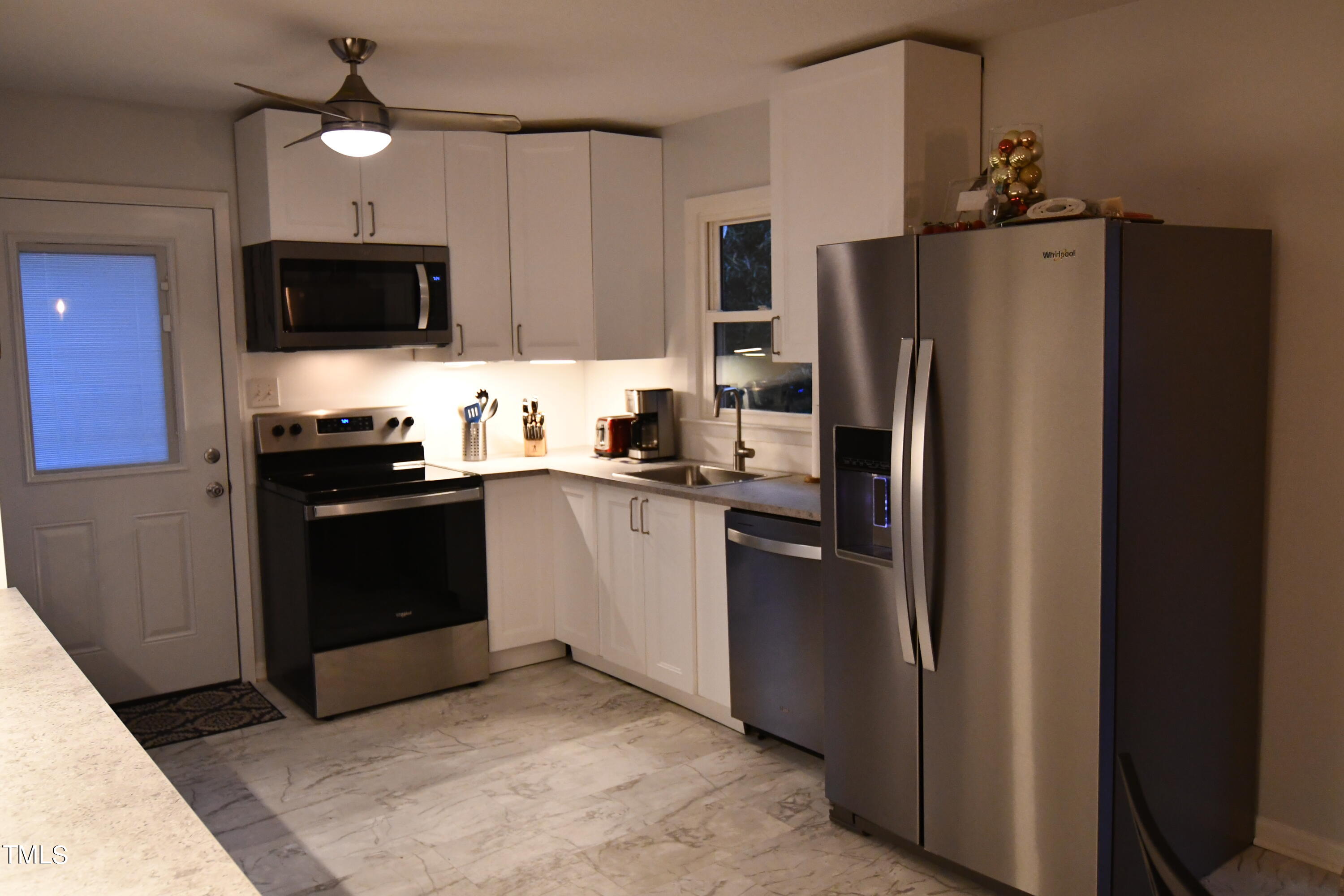 1401 North King Charles Road Raleigh, NC 27610 - Photo 4 of 21 View of kitchen from dining area.
