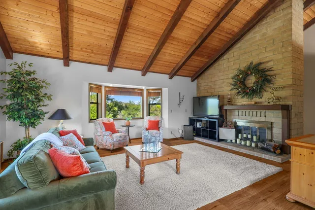 a kitchen with a sink cabinets and window