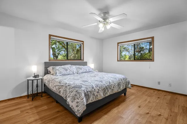 a view of staircase with empty racks and a potted plant