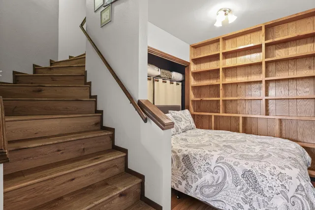 a bathroom with a sink toilet and a mirror