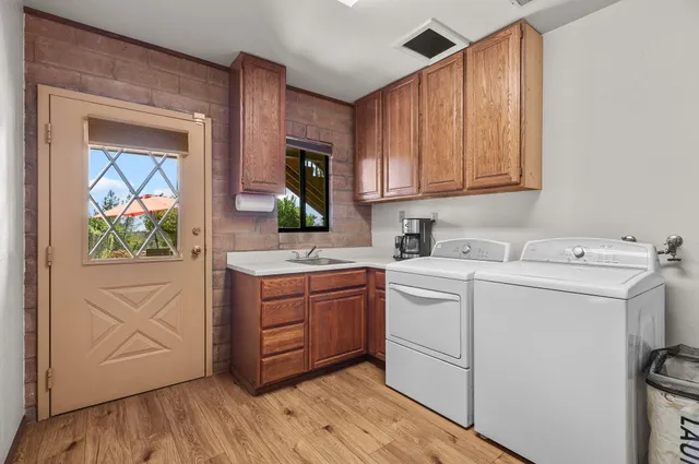 an outdoor space with swimming pool and furniture