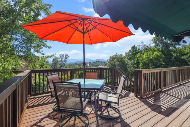a kitchen with sink cabinets and wooden floor