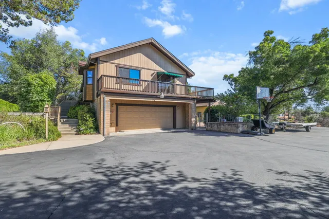 a view of a balcony with an outdoor space