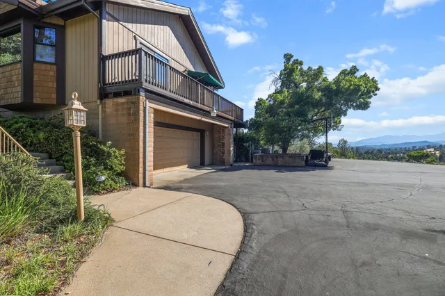a living room with furniture and a clock