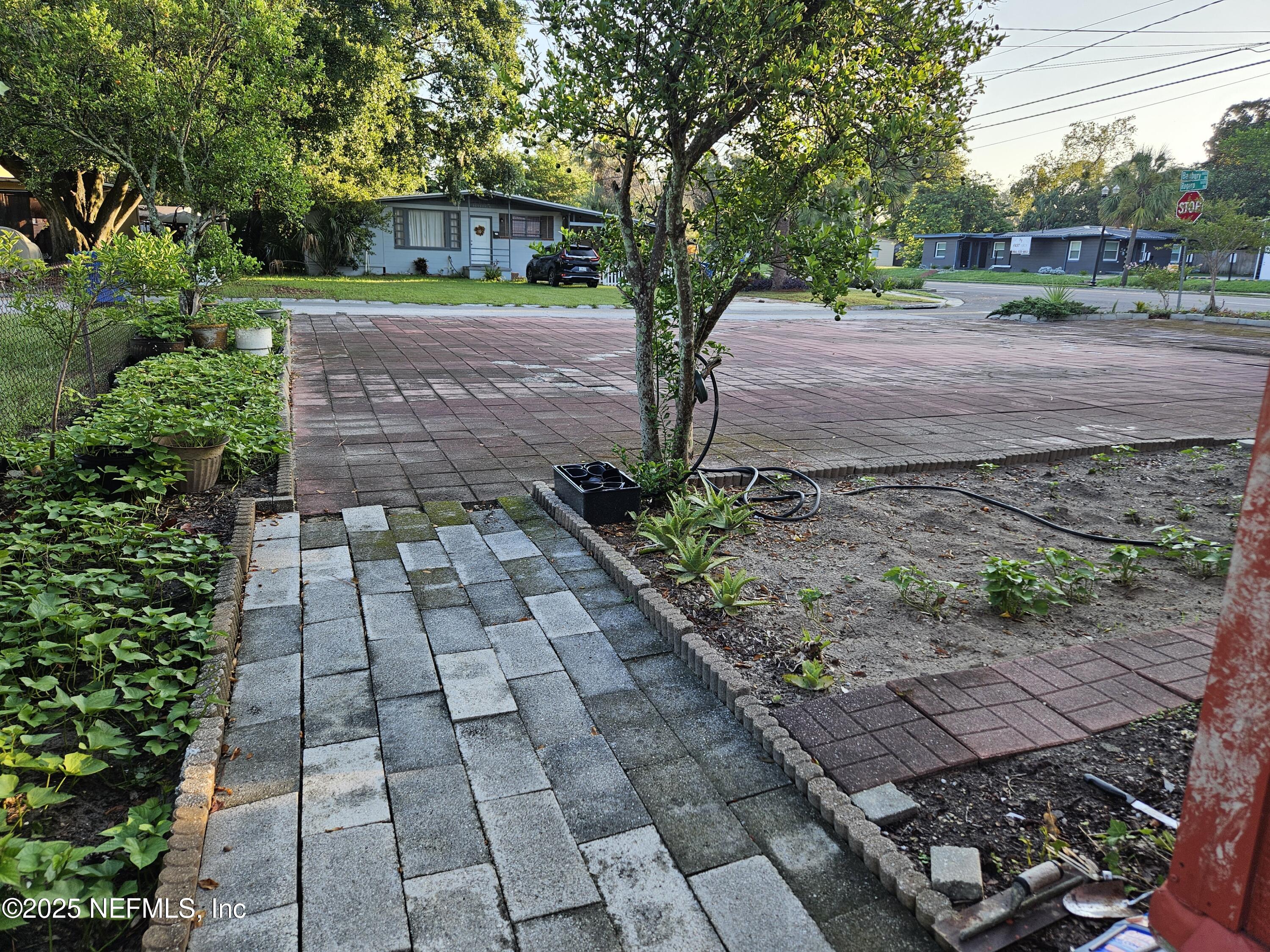 6672 Banbury Road Jacksonville, FL 32211 - Photo 19 of 25 SIDE OF BUILDING