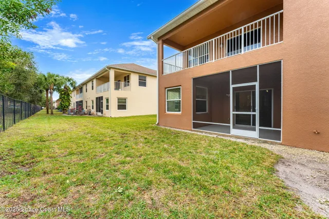 a view of a room with a large window