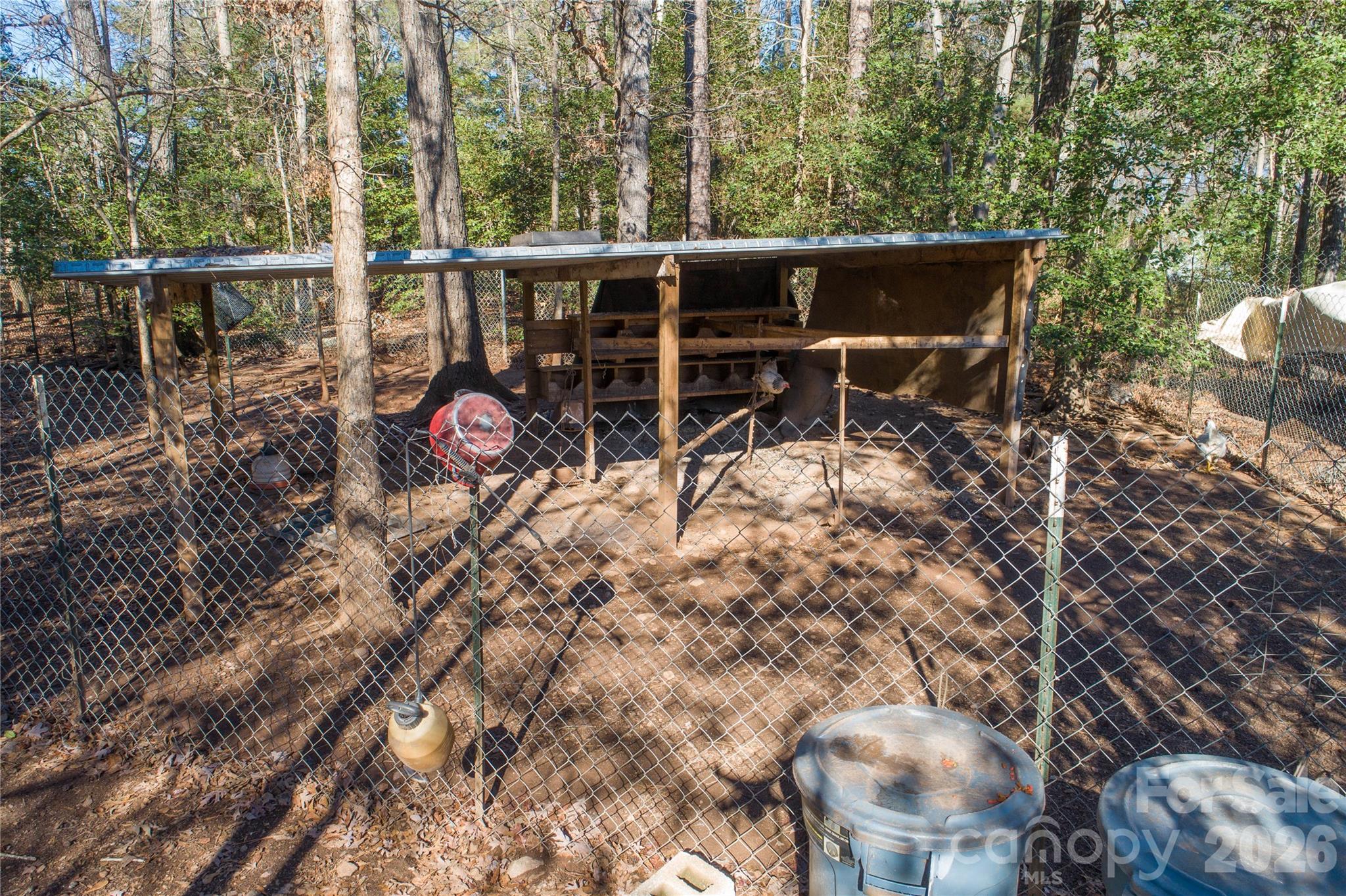 153 Lake Road Rockingham, NC 28379 - Photo 12 of 30 a view of a chairs and table in the roof