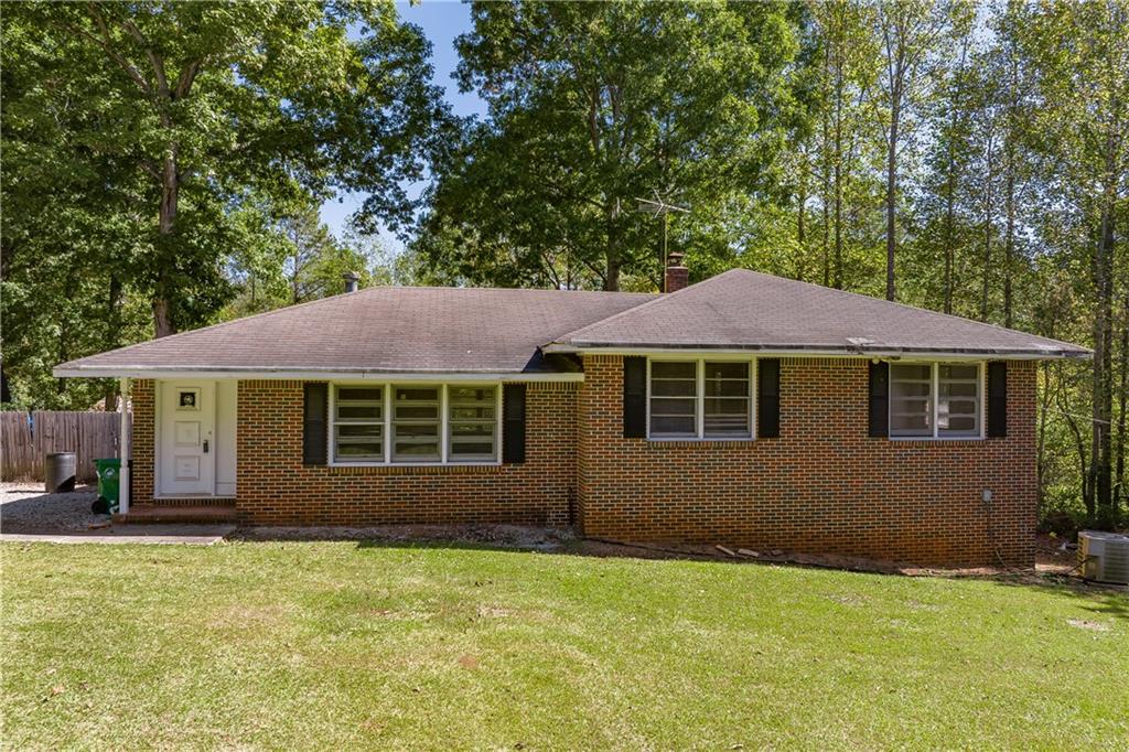 3976 Dogwood Farm Road Decatur, GA 30034 - Photo 1 of 1 a view of an house with backyard space and garden