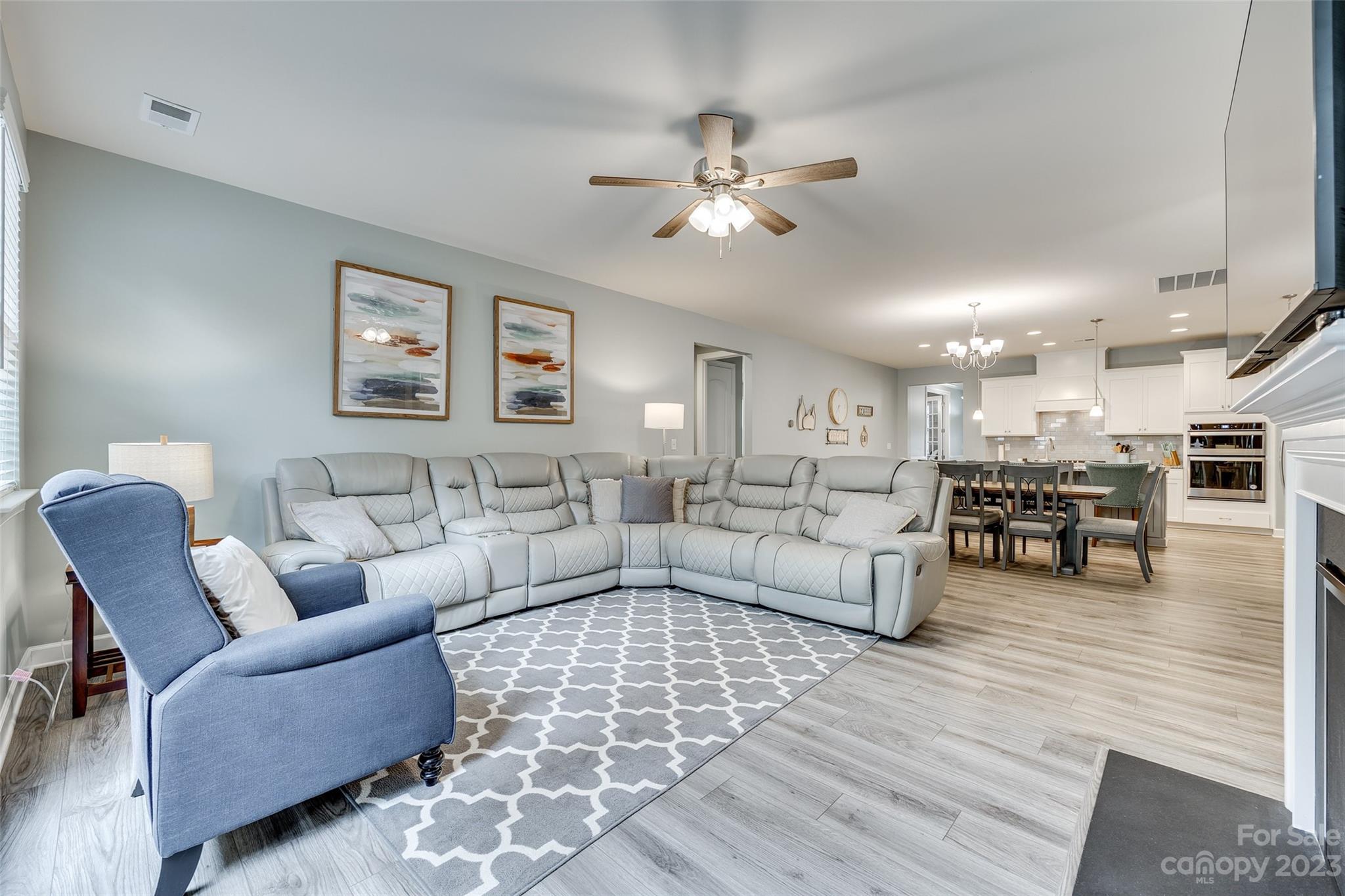 439 Sandbar Point Clover, SC 29710 - Photo 13 of 36 a living room with furniture and wooden floor