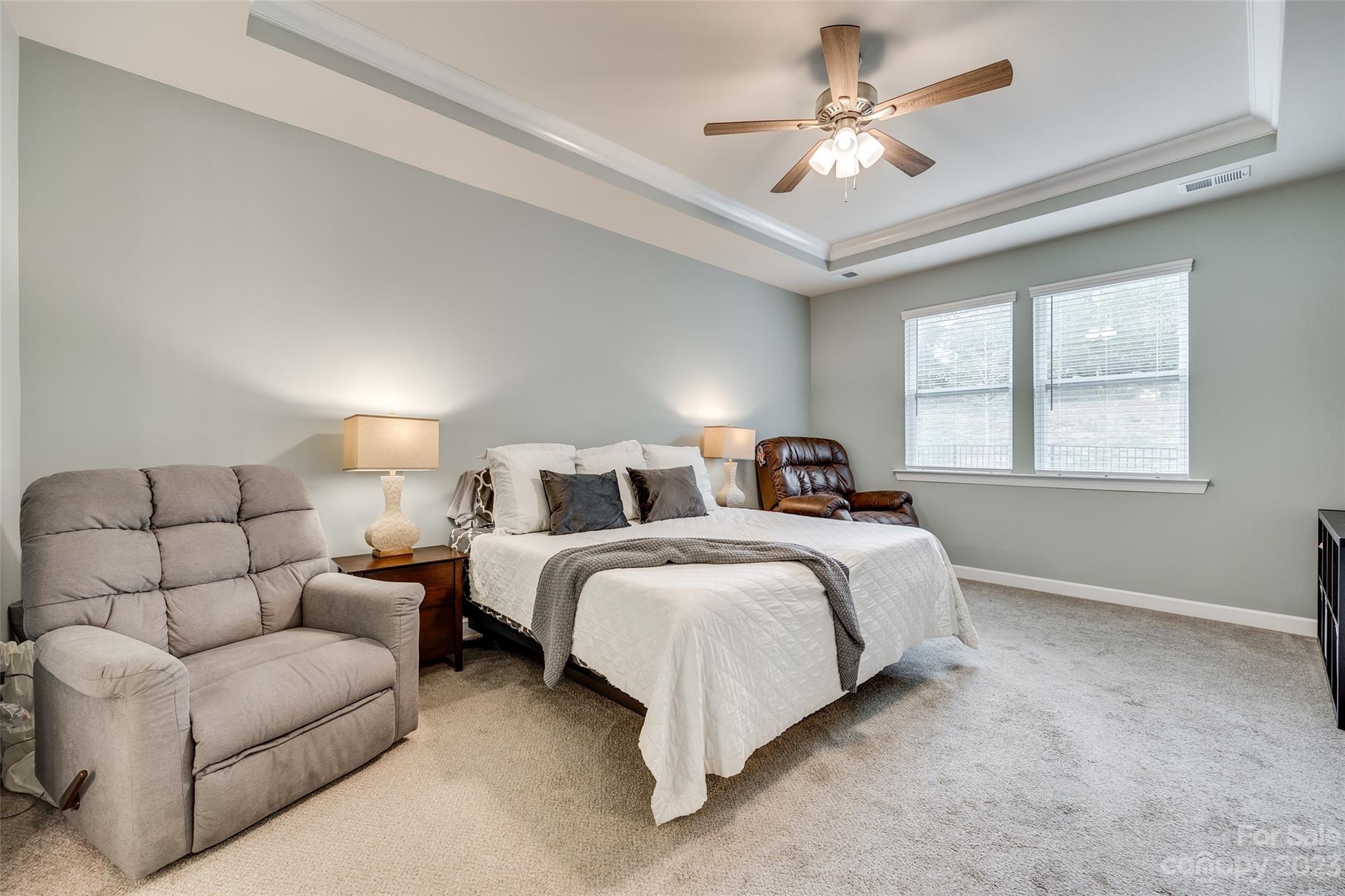 439 Sandbar Point Clover, SC 29710 - Photo 15 of 36 a bed room with bed and a couch