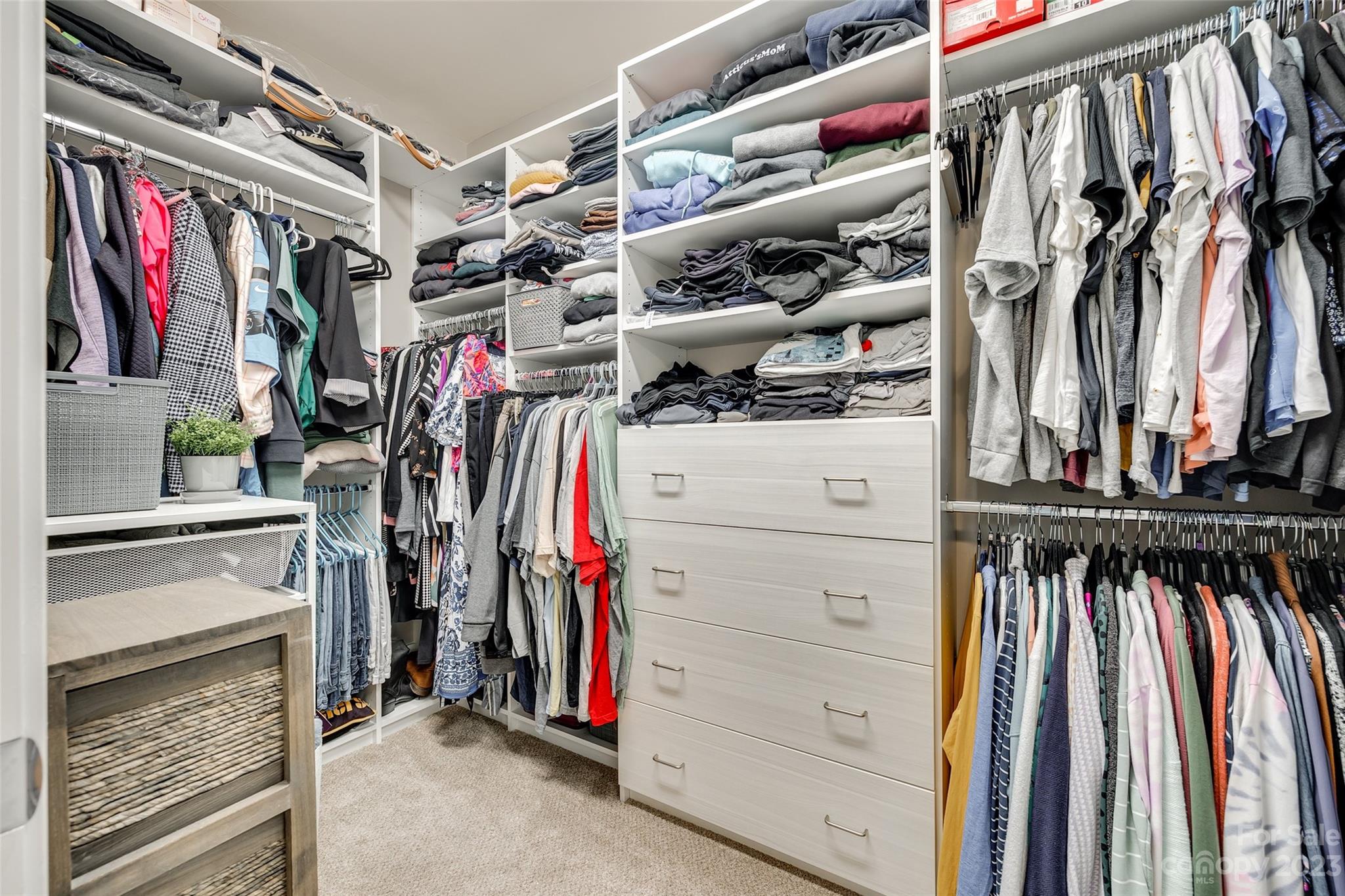 439 Sandbar Point Clover, SC 29710 - Photo 17 of 36 a view of walk in closet with clothes and shoes
