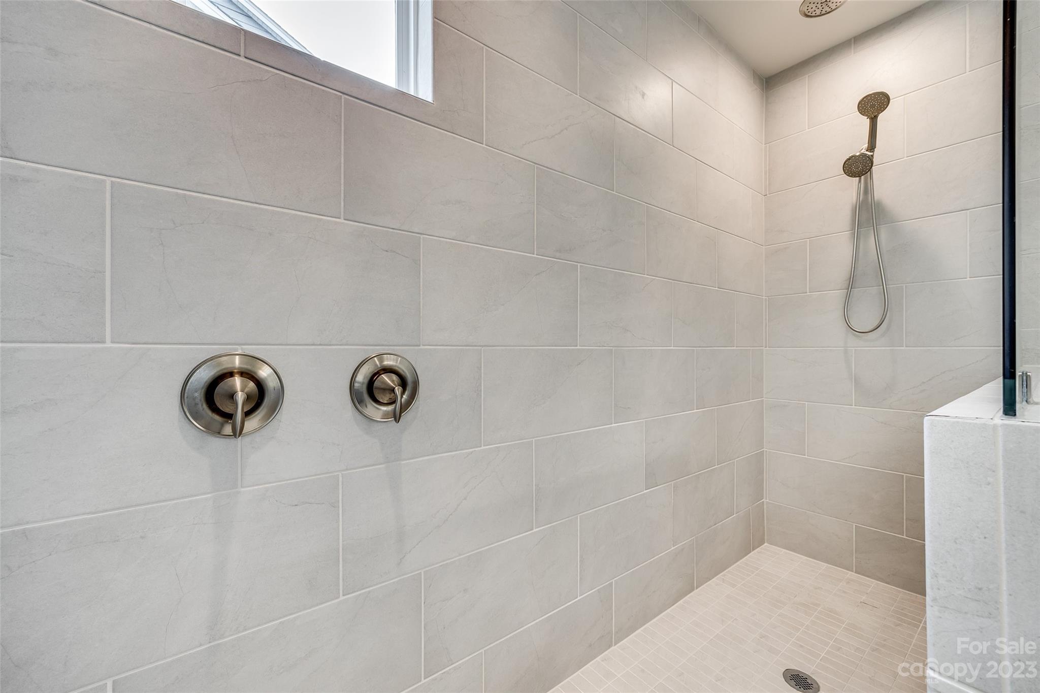 439 Sandbar Point Clover, SC 29710 - Photo 19 of 36 a bathroom with a shower
