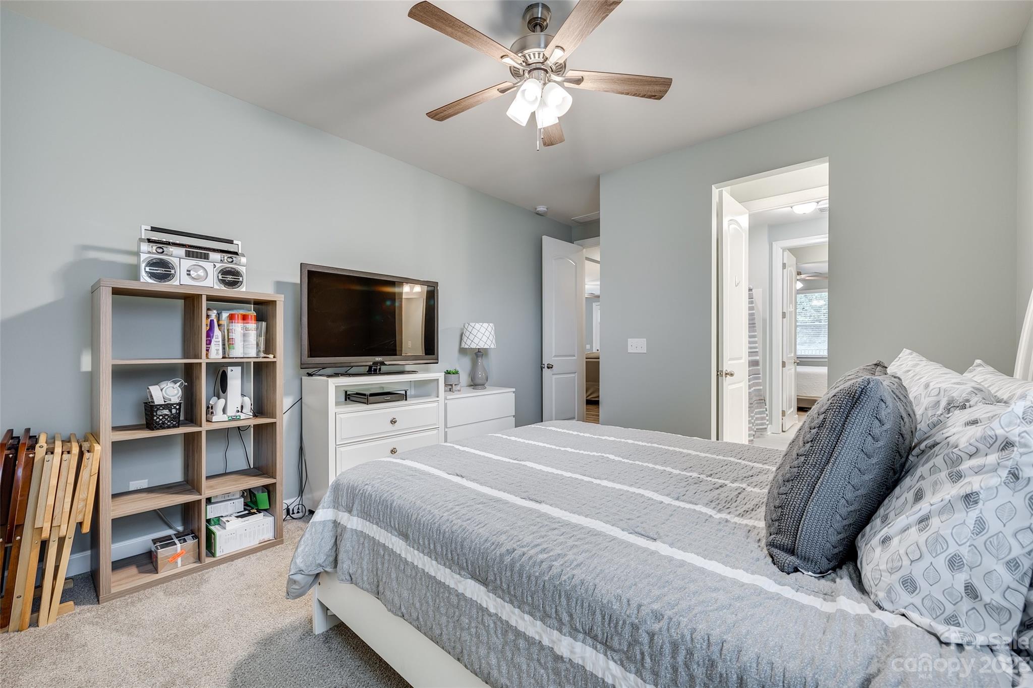 439 Sandbar Point Clover, SC 29710 - Photo 23 of 36 a bedroom with a bed and a flat screen tv