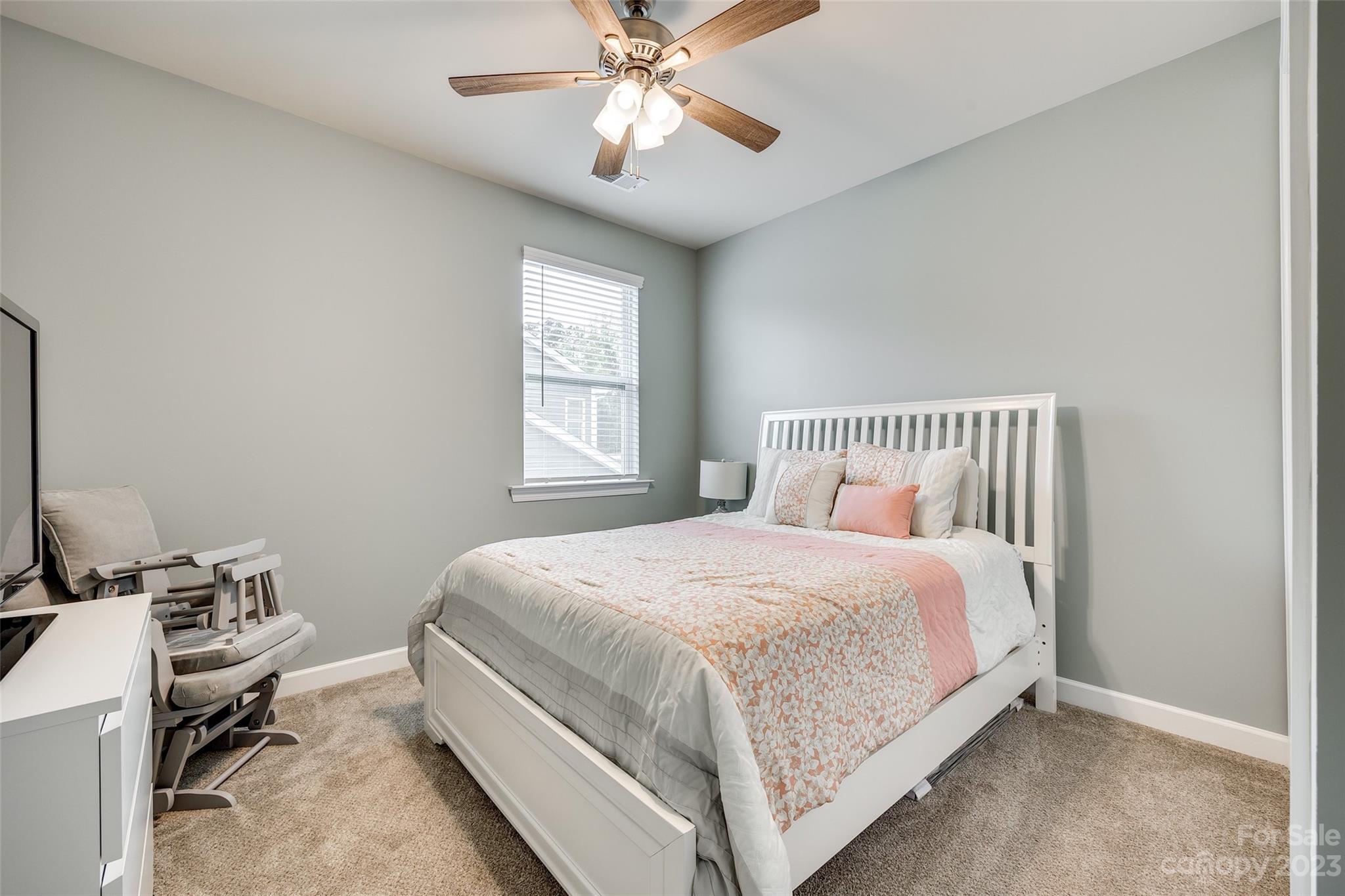 439 Sandbar Point Clover, SC 29710 - Photo 28 of 36 a bedroom with a bed and a window