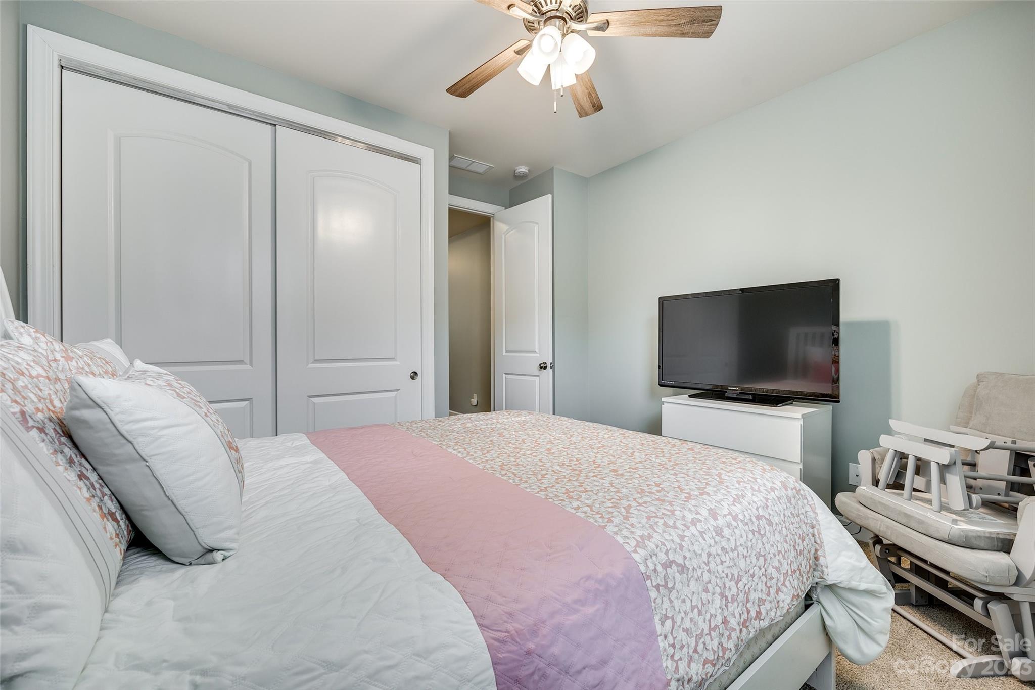 439 Sandbar Point Clover, SC 29710 - Photo 29 of 36 a bedroom with a bed and a flat screen tv