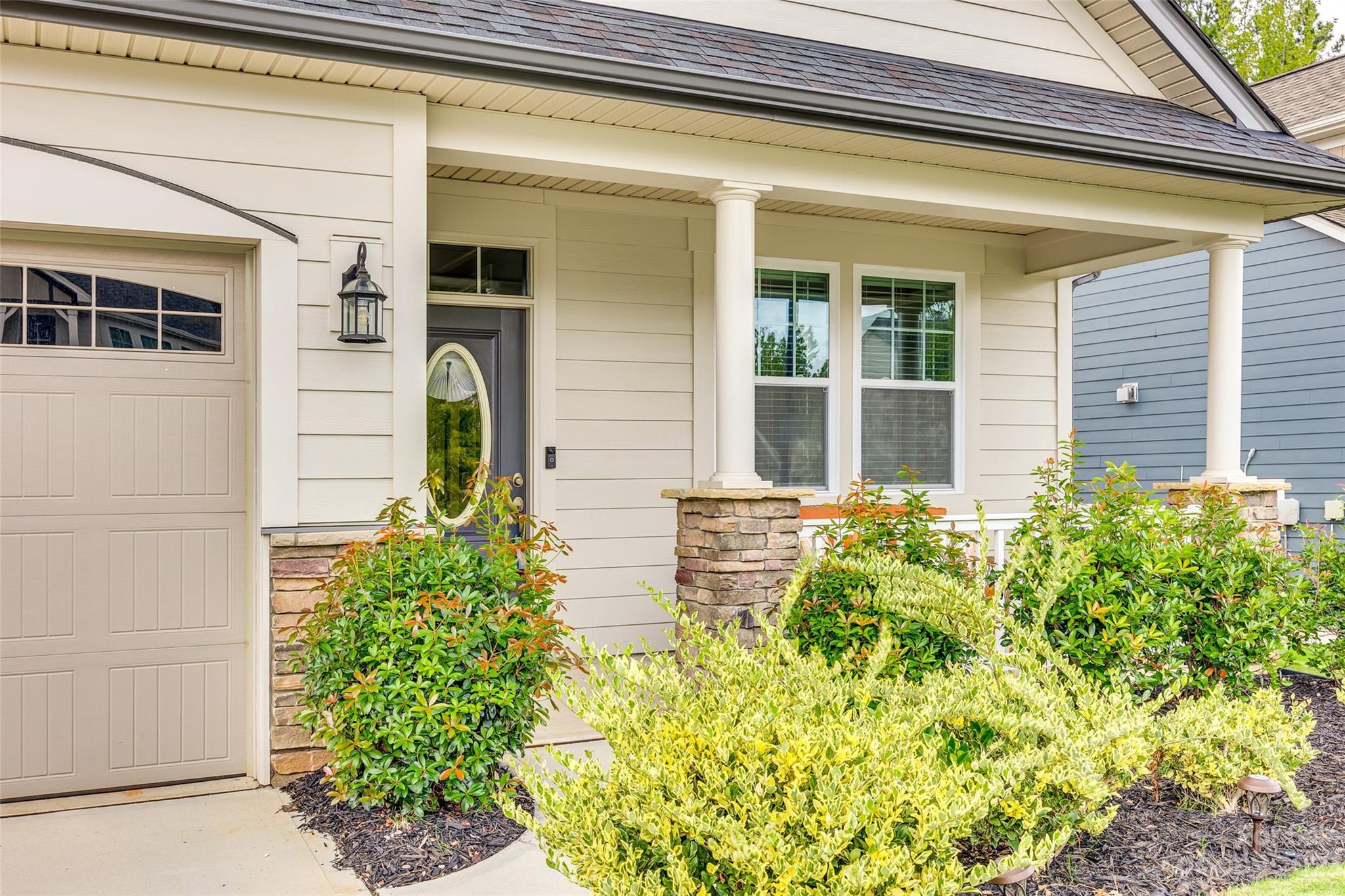 439 Sandbar Point Clover, SC 29710 - Photo 3 of 36 a front view of a house having a yard