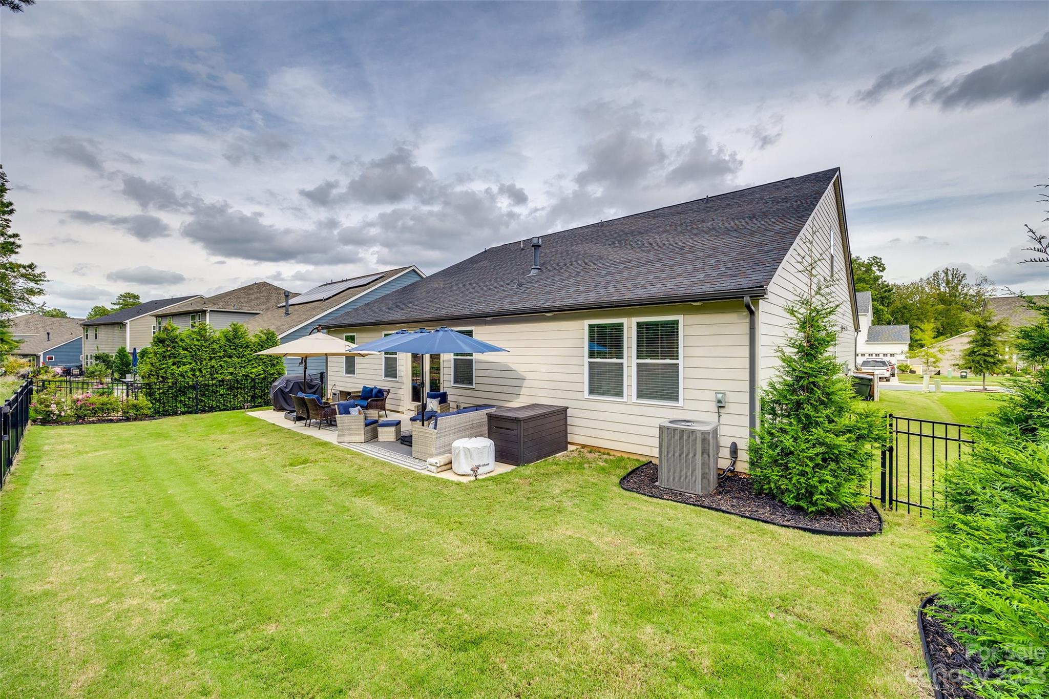 439 Sandbar Point Clover, SC 29710 - Photo 34 of 36 a view of a house with backyard and sitting area