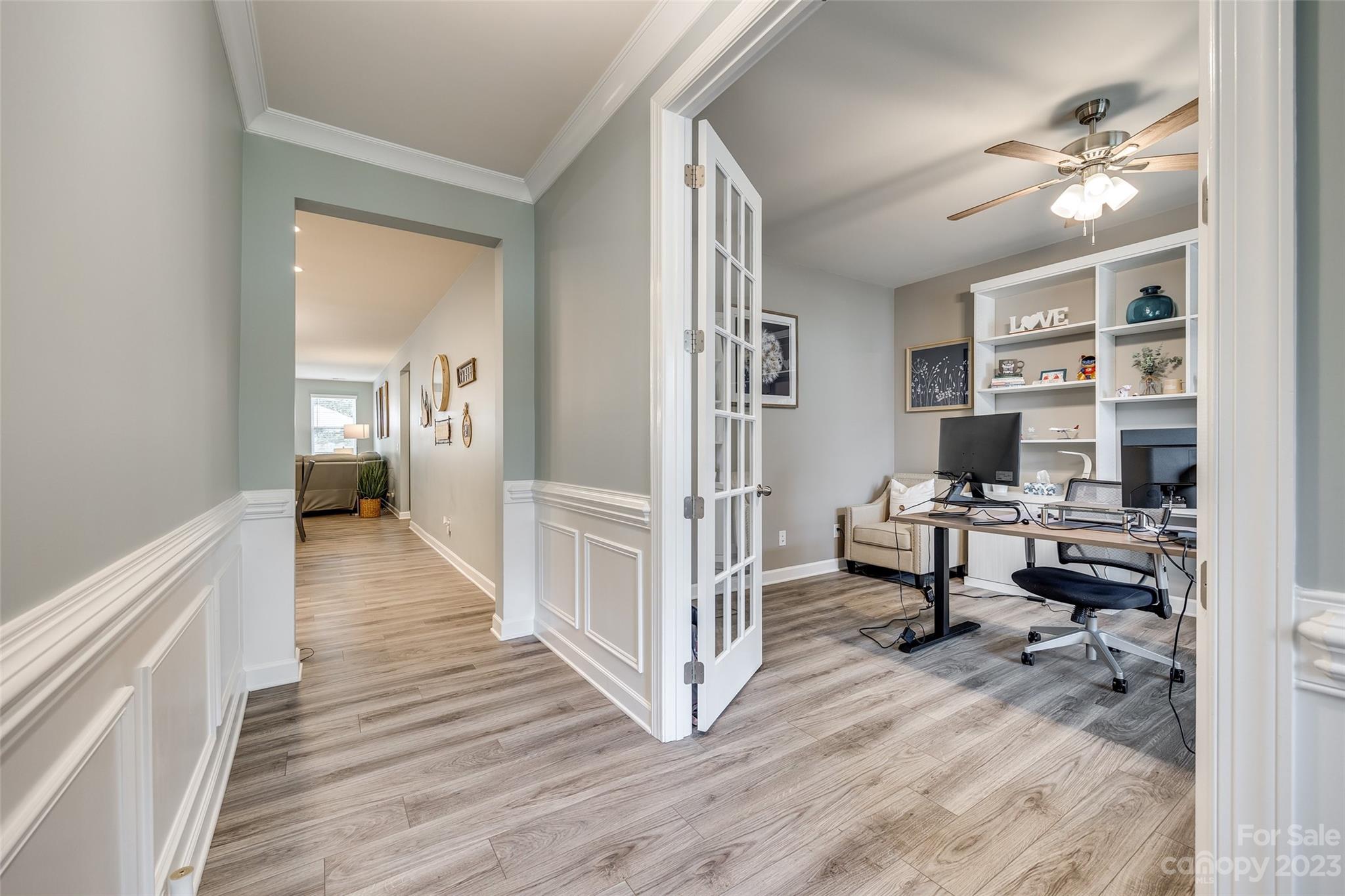 439 Sandbar Point Clover, SC 29710 - Photo 5 of 36 a view of a workspace with wooden floor and furniture