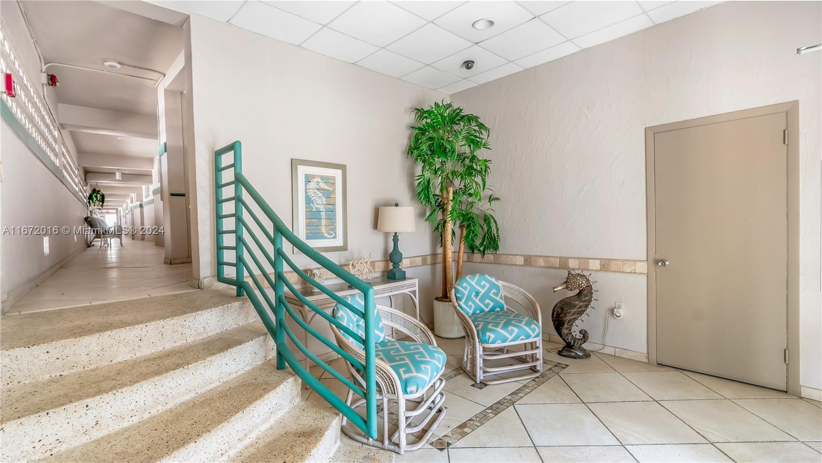 201 Van Buren Street, Unit 103 Hollywood, FL 33019 - Photo 20 of 25 a living room with furniture