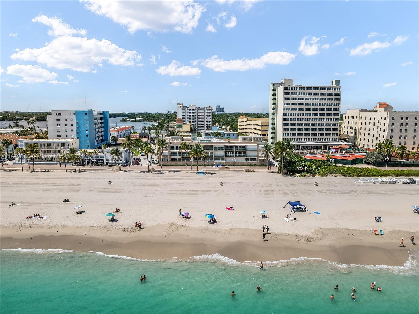 201 Van Buren Street, Unit 103 Hollywood, FL 33019 - Photo 23 of 25 a view of swimming pool and ocean
