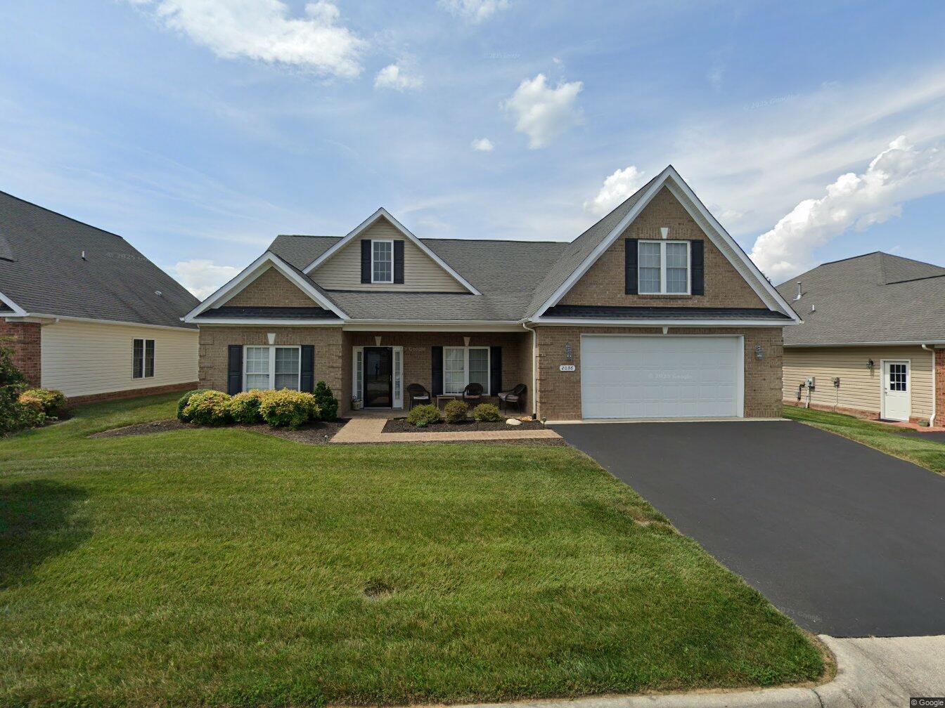 2036 River Ridge Court Salem, VA 24153 - Photo 1 of 14 a front view of a house with swimming pool having outdoor seating