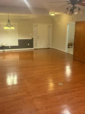a view of a living room with a bathroom