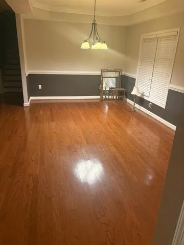 a view of an empty room with a sink