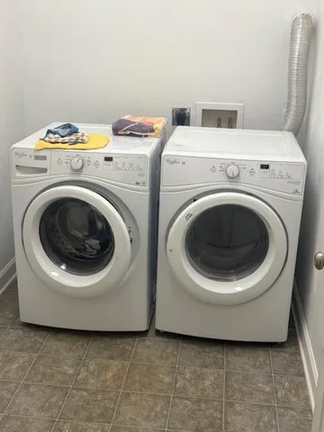 a utility room with dryer and washer