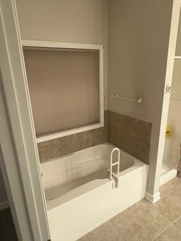a bathroom with a bathtub