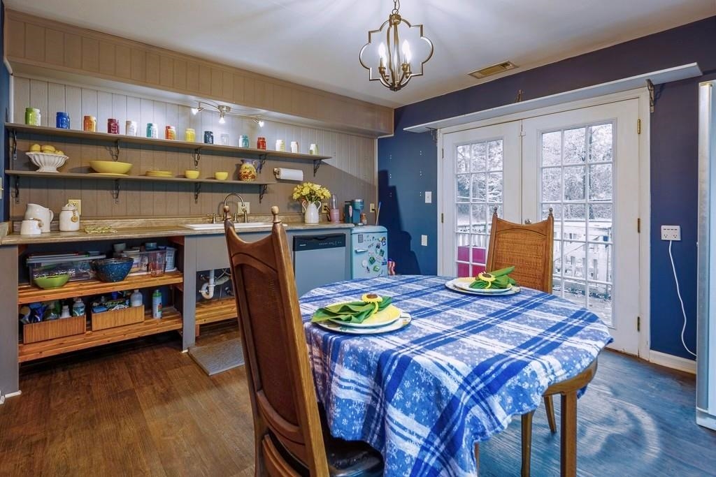 4036 Shelby Road Millington, TN 38053 - Photo 17 of 26 a dining room with furniture and chandelier