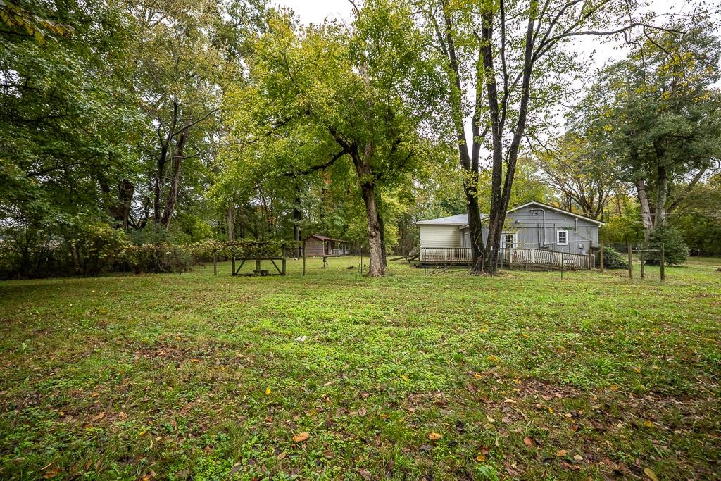 4036 Shelby Road Millington, TN 38053 - Photo 8 of 26 a view of a house with a yard