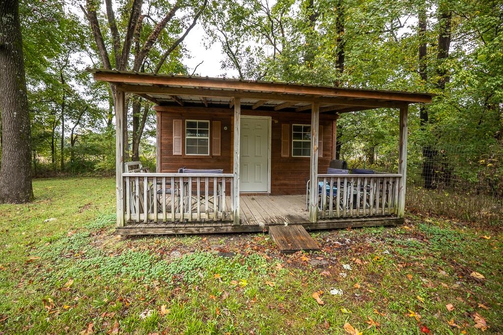 4036 Shelby Road Millington, TN 38053 - Photo 10 of 26 front view of a house with a small yard