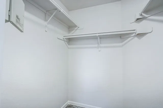 a view of an empty walk in closet