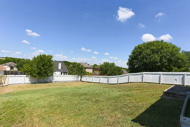 a view of swimming pool with outdoor seating