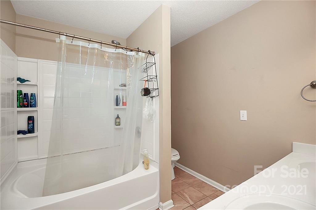 1407 George Dunn Road Rock Hill, SC 29730 - Photo 6 of 11 a bathroom with a bathtub and a shower