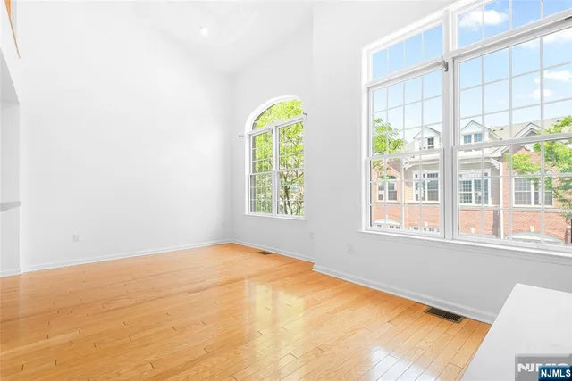 a view of a room with windows