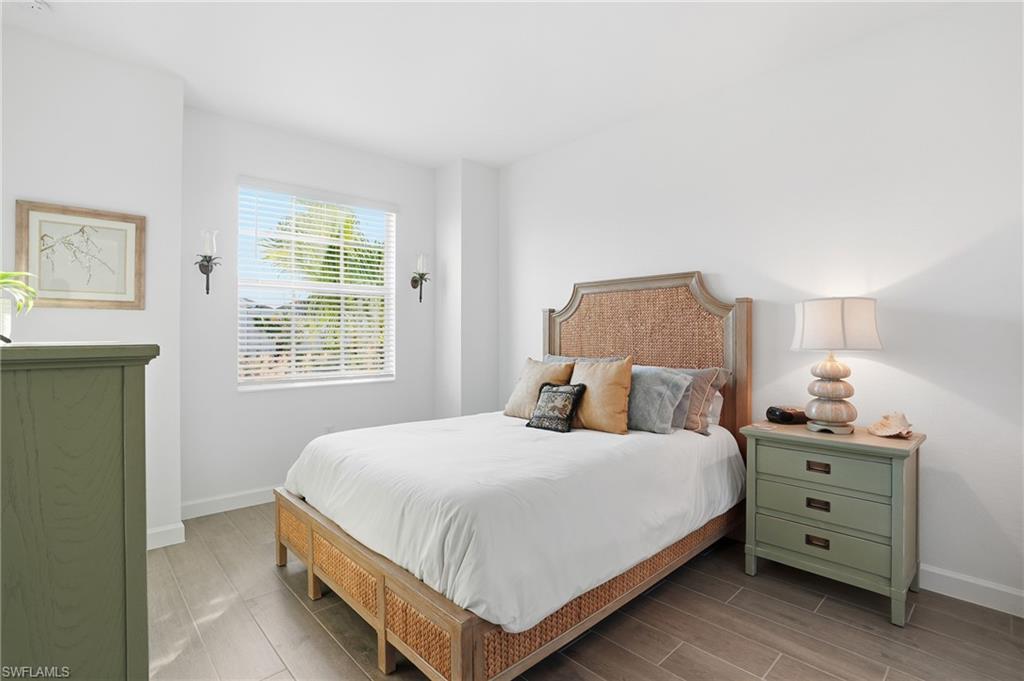 44481 Mesquite Lane Babcock Ranch, FL 33982 - Photo 25 of 34 a bedroom with a bed and a window