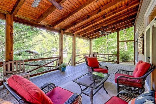 a view of a two chairs in the balcony