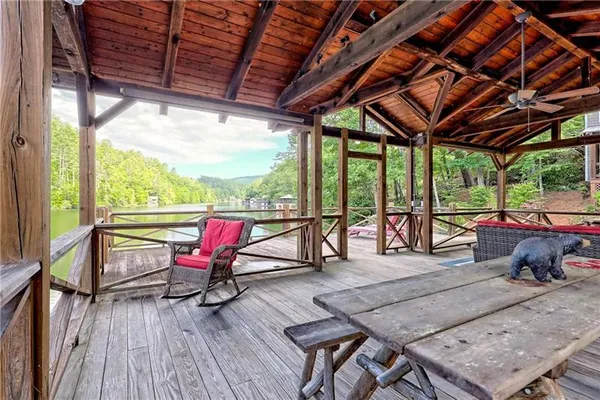 a view of a lake with sitting area