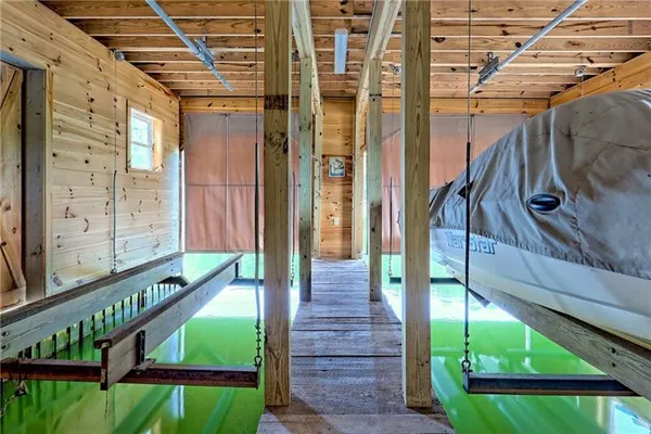 a balcony with wooden floor and outdoor space