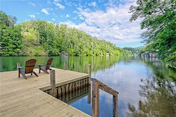 a view of a lake with a yard