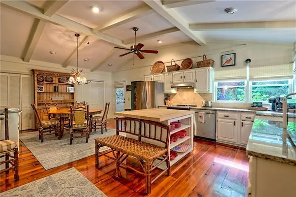 a very nice looking kitchen with a large window