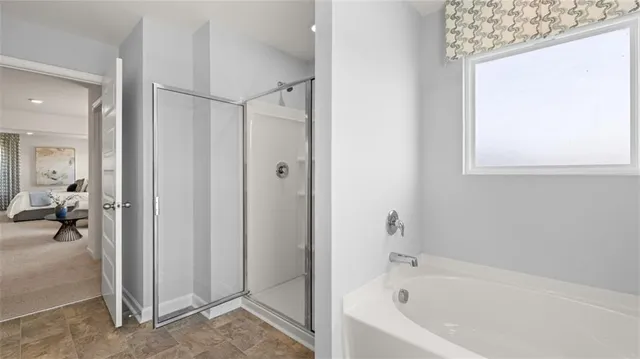 a bathroom with a sink double vanity granite tub and shower